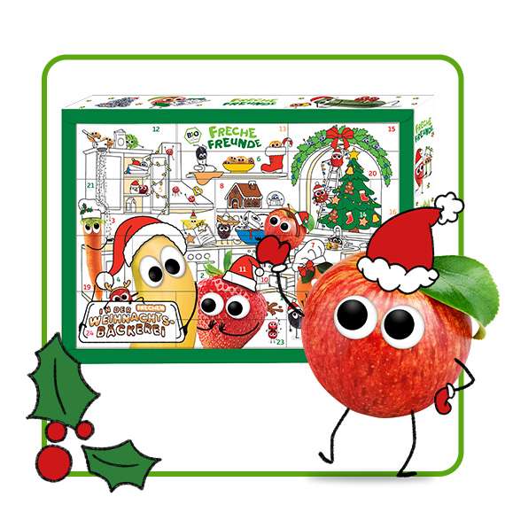 Alfred Apfel mit Weihnachtsmütze steht neben dem Adventskalender 2025 für Kinder.